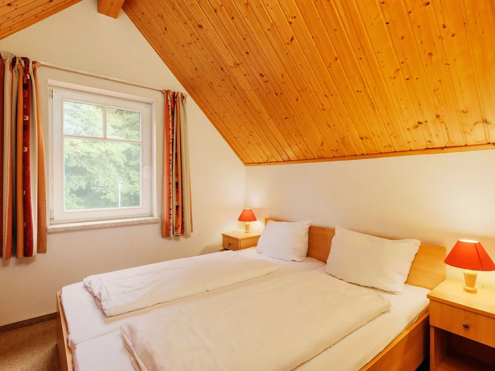 Cozy Holiday Home with Wood Burning Stove near Water