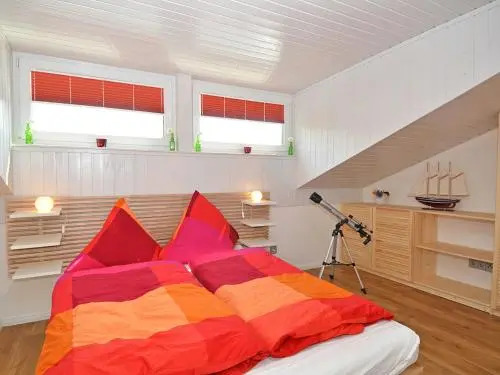 Ferienhaus "Luv & Lee" F589 WG 3 mit Dachschrägen und Terrasse