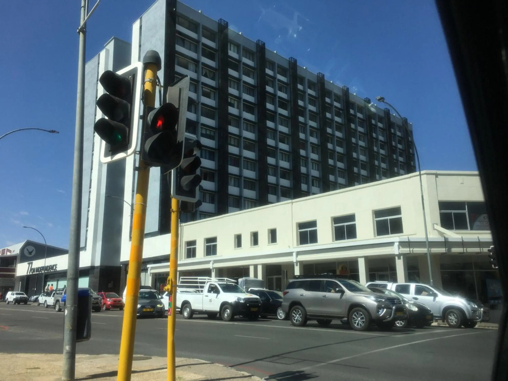 Highrise Windhoek apartment with skyline view, pool and gym