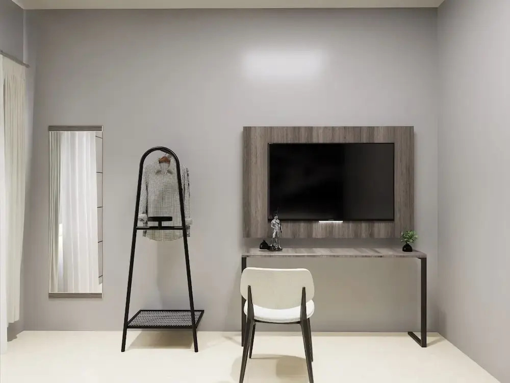 Darmo Inn By News Hotel