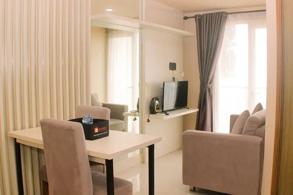 Cozy and Comfort Living 1BR at Oasis Cikarang Apartment By Travelio