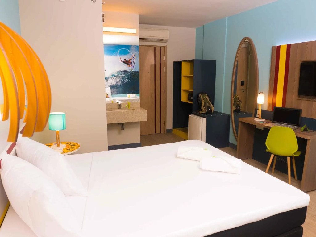 Golden Tulip Guarujá - Antigo Delphin Surf Hotel