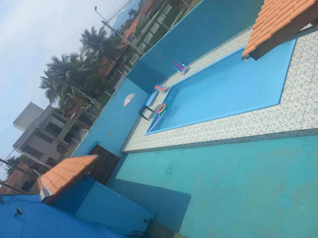 CASA DE PRAIA CARAGUA COM Piscina