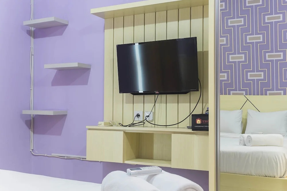 Homey And Comfy Studio Apartment At Sentra Timur Residence