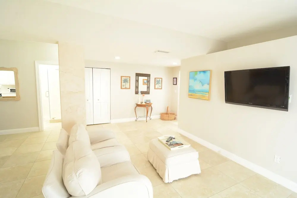 Beautiful Canal Front Home With Above Ground Pool, Dock And Fish Cleaning Station 4 Bedroom Home by RedAwning