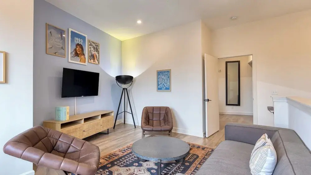 Sleeps 44 4 Themed Lofts w/ Skyline Balconies, Neon Backdrops & Glam Kitchensperfect for Nashville Group Stays The Swift Retreat by Avantstay