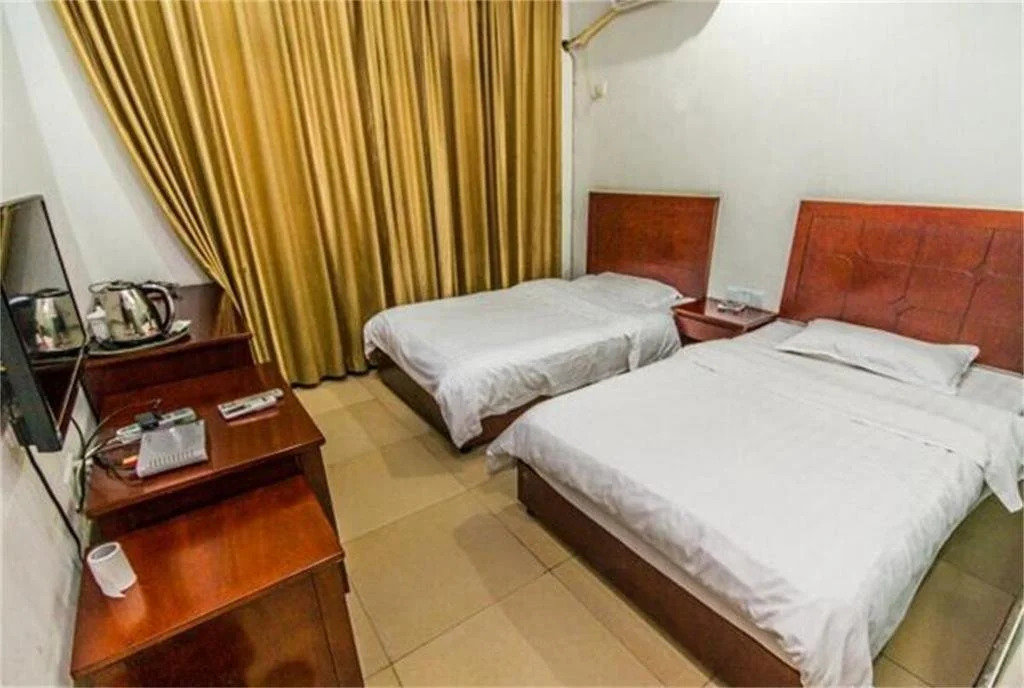 Yibin Meilun Business Hotel