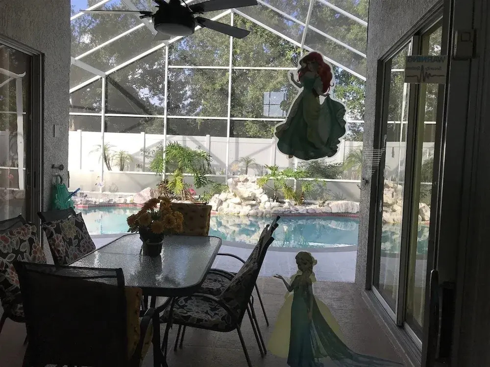 3 Bedroom Home With Private Screened Pool With Rock Waterfall Feature and Gameroom by Florida Dream Homes