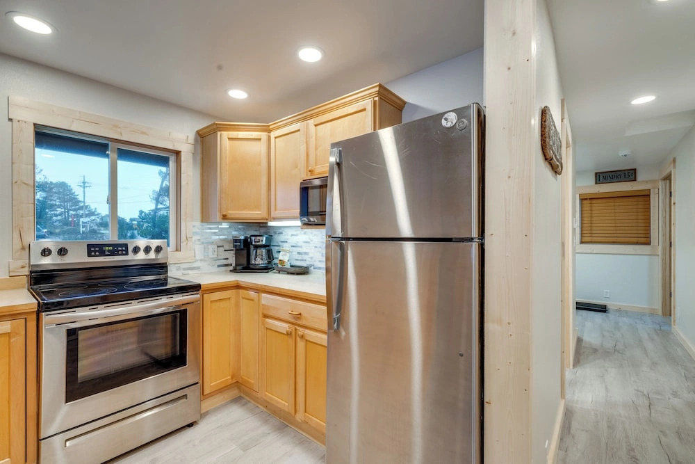 Riverfront Coastal Retreat With Easy Beach Access