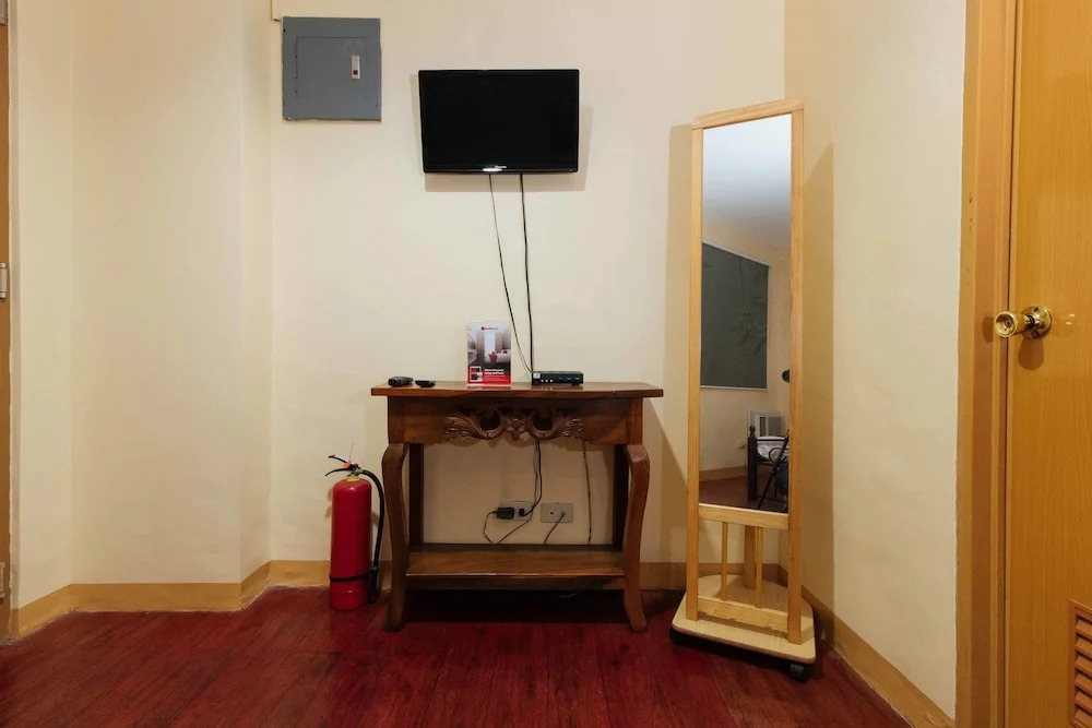 City Traveler Suites by RedDoorz