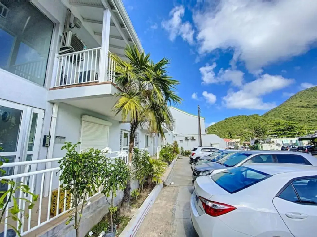 Pavillon Beach 9, feet in the water in Grand Case