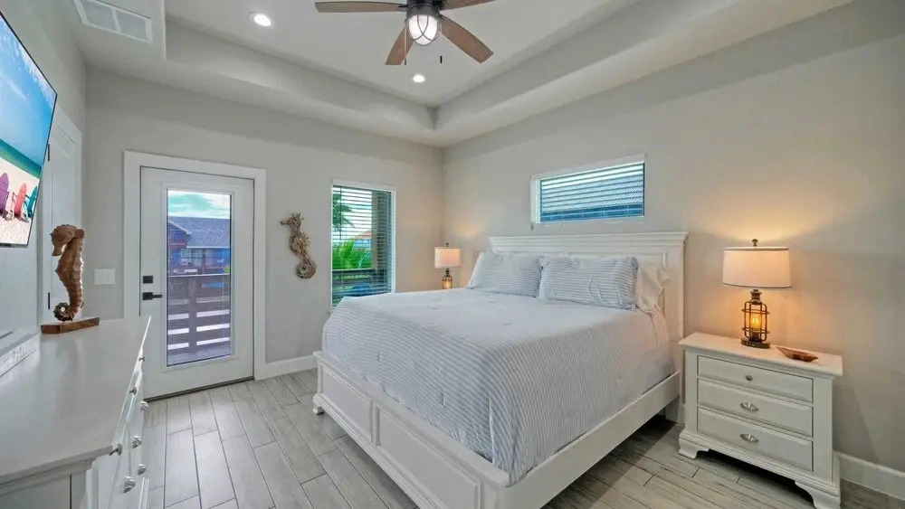 Bayfront Home w/ Pool, Game Room + Walk to Beach & Golf Cart Access Pelicans Perch by Avantstay