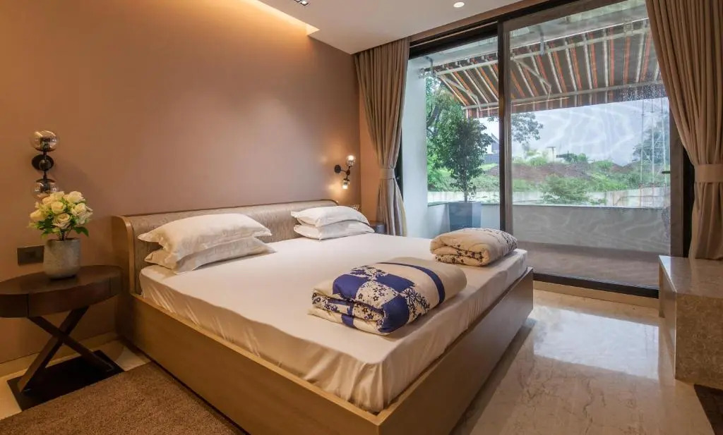 Villa 41 by StayVista - A chic retreat with a pool, poker table, and a theater room