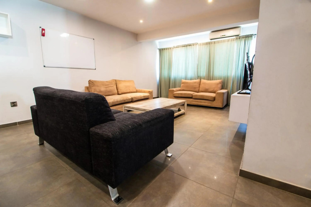 Renovated 2-bedroom flat with free parking, center