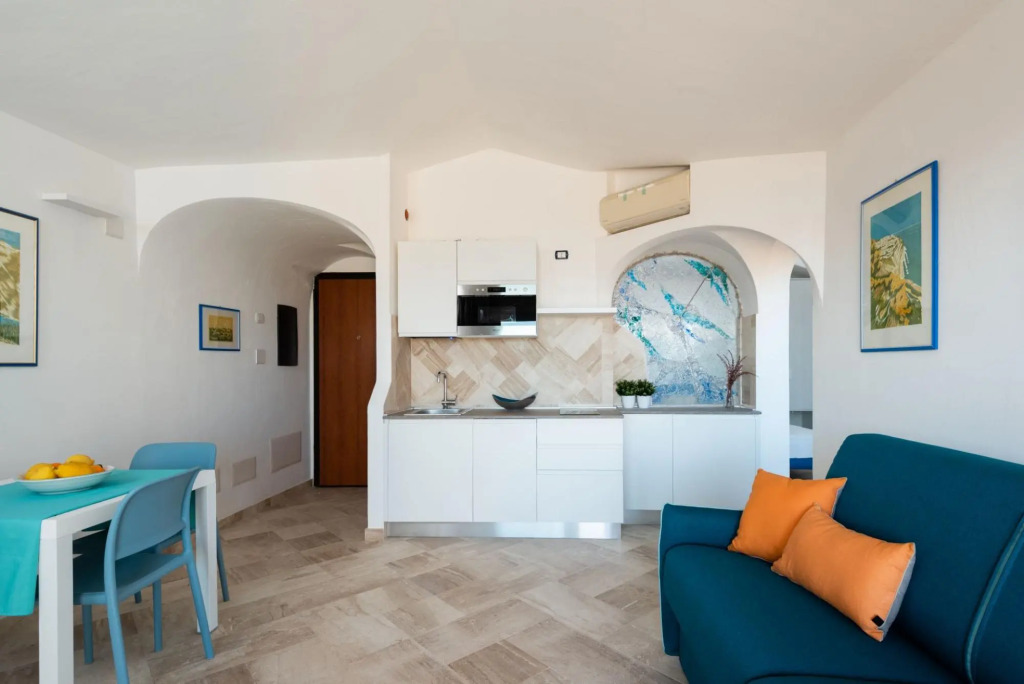 it has 1 bedroom communicating with living room with sofa bed, kitchen, large terrace (with table an-SHERDEN BILO 8