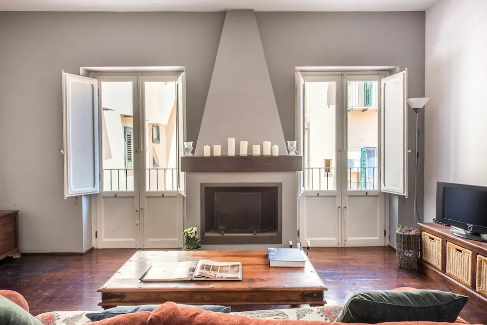 Terrazza e stile sui tetti della Kalsa
