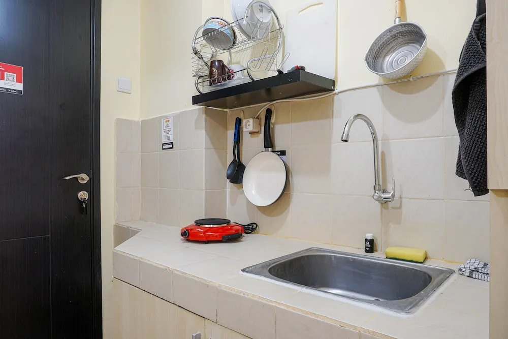 Nice and Elegant Studio at Belmont Residence Puri Apartment By Travelio
