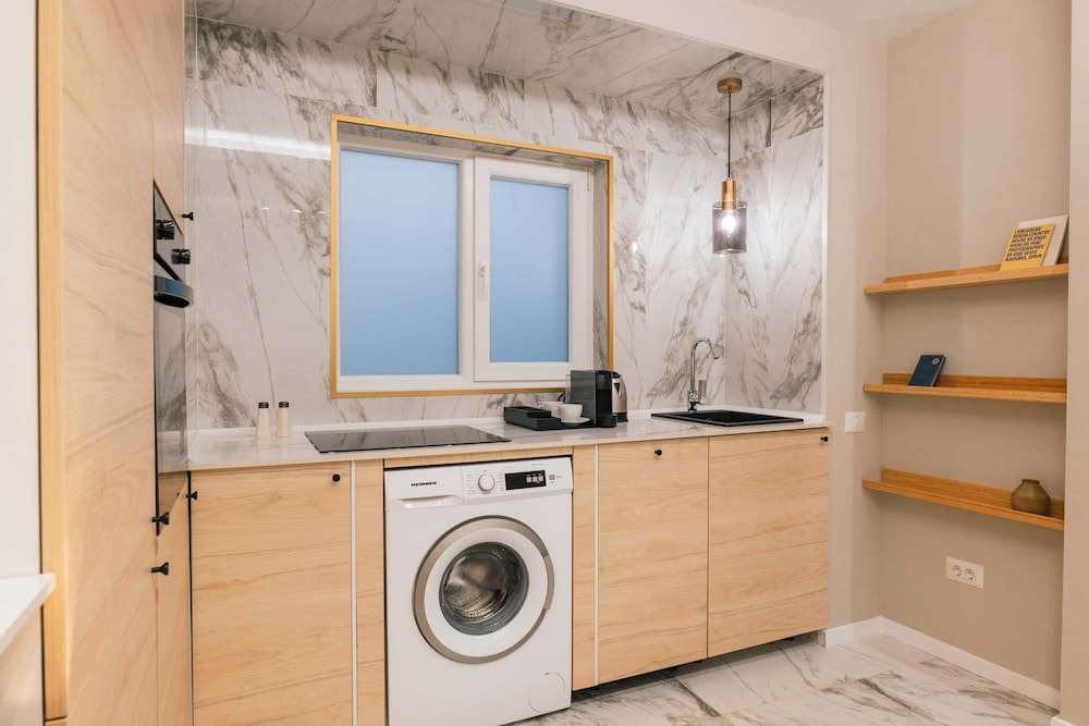 New Unirii Apartments by Olala Homes