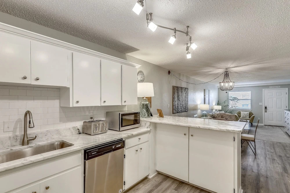 Venus 206 is a 1 BR on Okaloosa Island steps from the pool and easy beach access by RedAwning