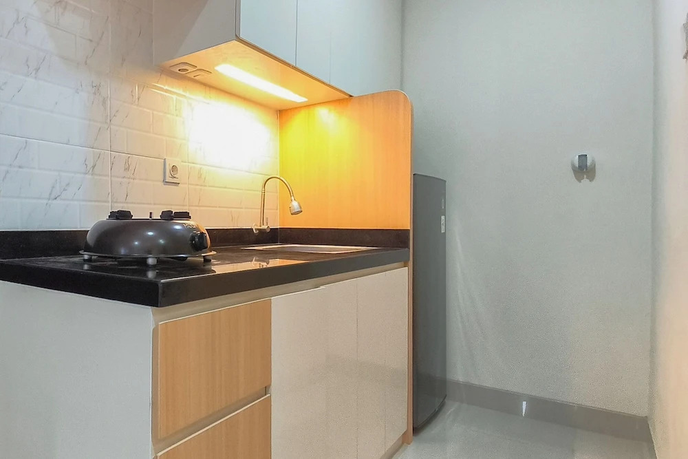 Comfy Modern Look Studio Room At Apartment Grand Dharmahusada Lagoon