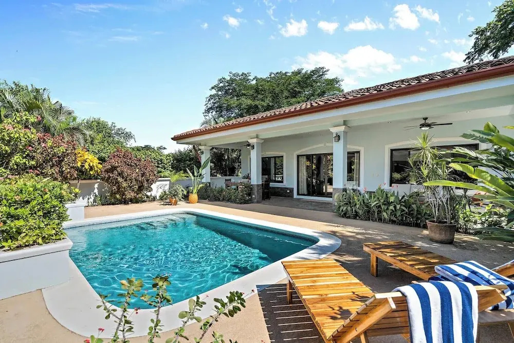 Stylish Home with Chic Decor, Luxury Amenities & Tropical Outdoor Oasis with Sparkling Private Pool