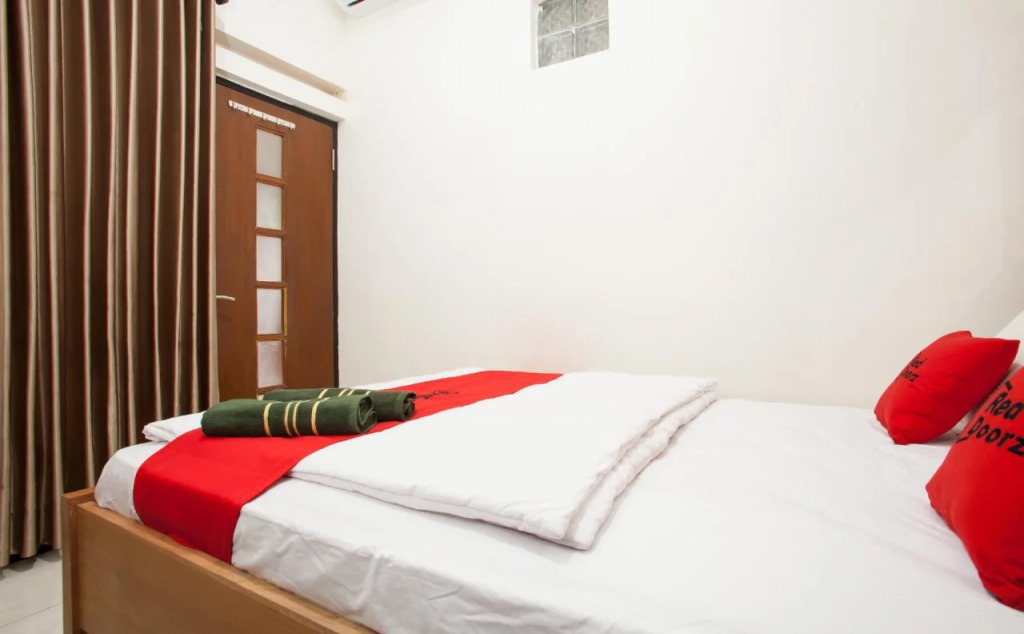 RedDoorz Syariah near Singha Merjosari Park