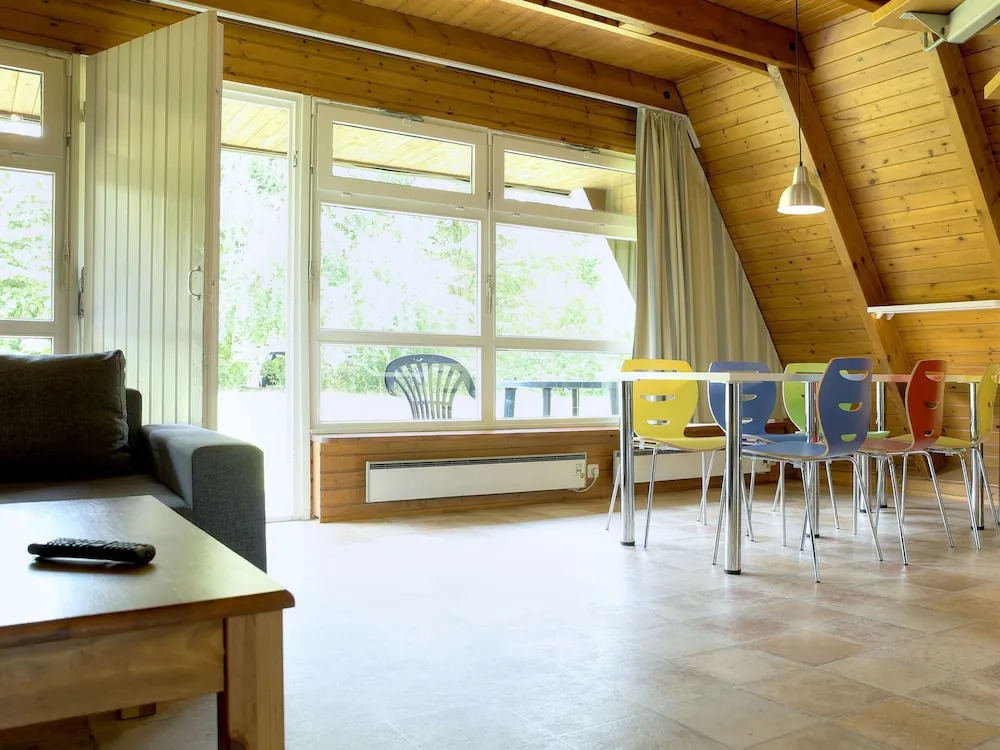 Detached holiday home, decorated with wood, on the Ostsee