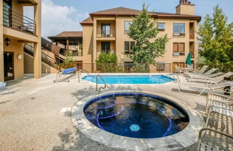 Spacious Ski in, Ski out 3 Bedroom Vacation Rental Next to the Gondola Featuring Slopeside Heated Outdoor Pool and Hot Tub