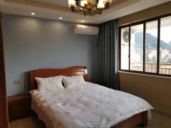 Xinchang Guanjing Homestay