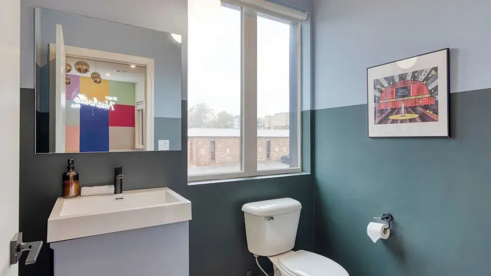 Sleeps 44 4 Themed Lofts w/ Skyline Balconies, Neon Backdrops & Glam Kitchensperfect for Nashville Group Stays The Swift Retreat by Avantstay