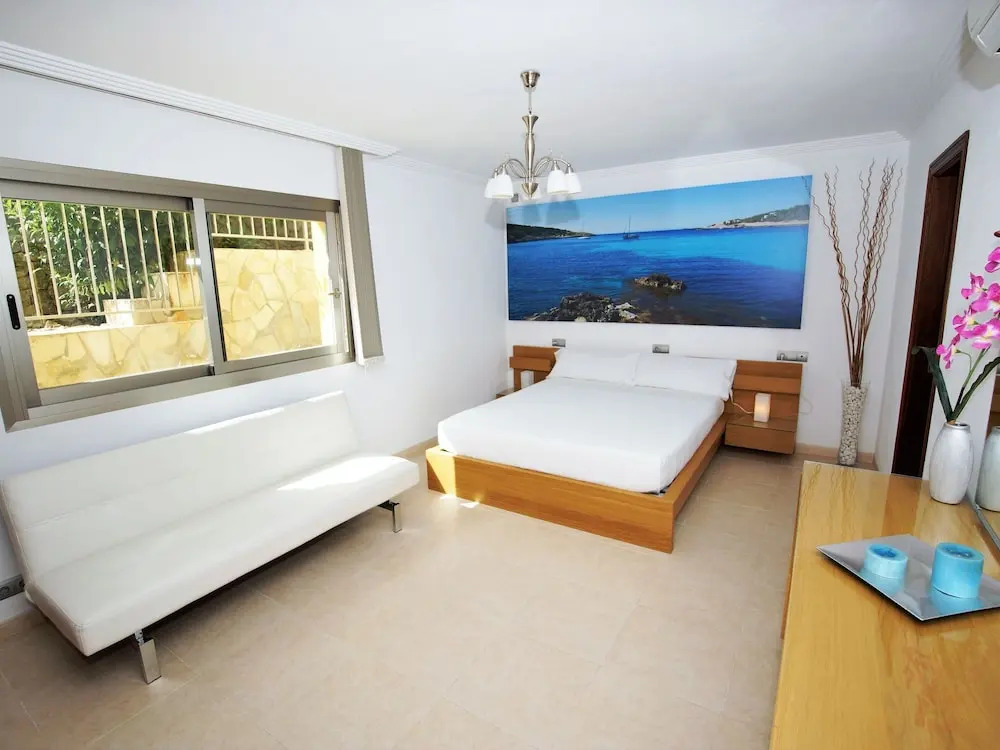 Spacious modern villa, with beautiful waterfall in Talamanca near Ibiza town!