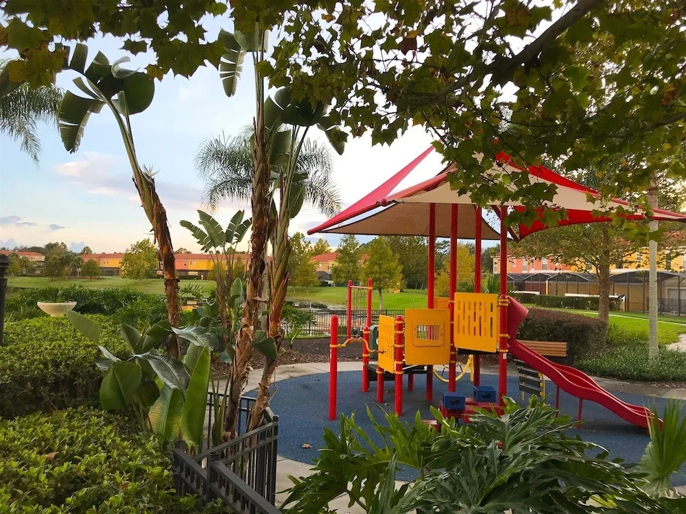 Private Screened Splash Pool Overlooking Tranquil Lake Right Beside Disney World by Florida Dream Homes