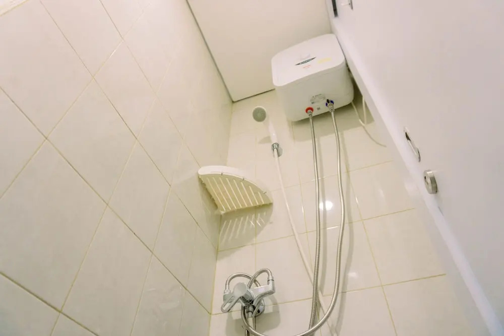 Homey And Cozy Living Studio Poris 88 Apartment