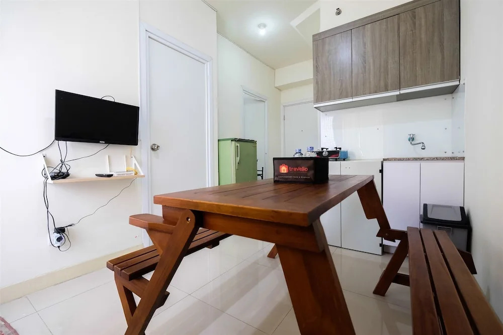 2BR Artistic Room Green Pramuka Apartment closed to Mall By Travelio