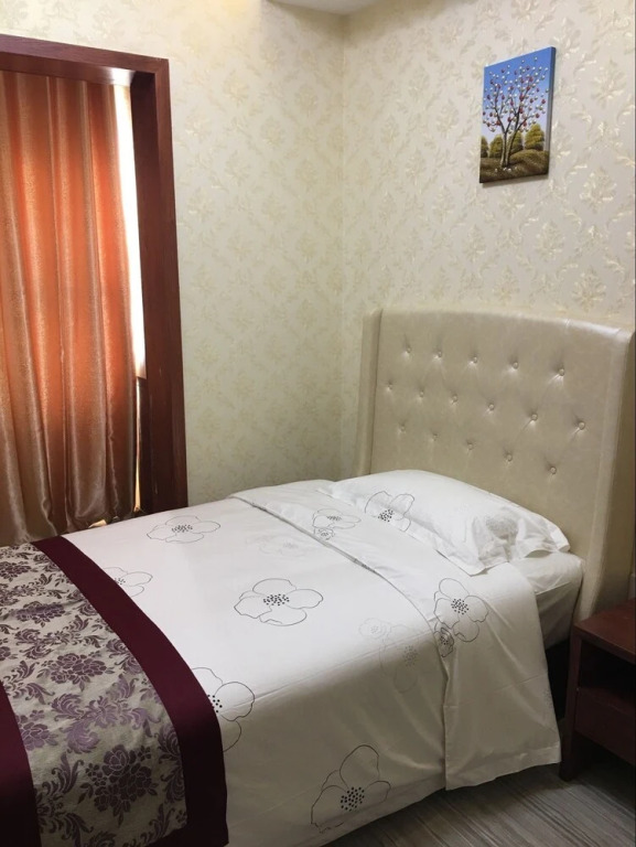 Tie Cheng Apartment Hotel