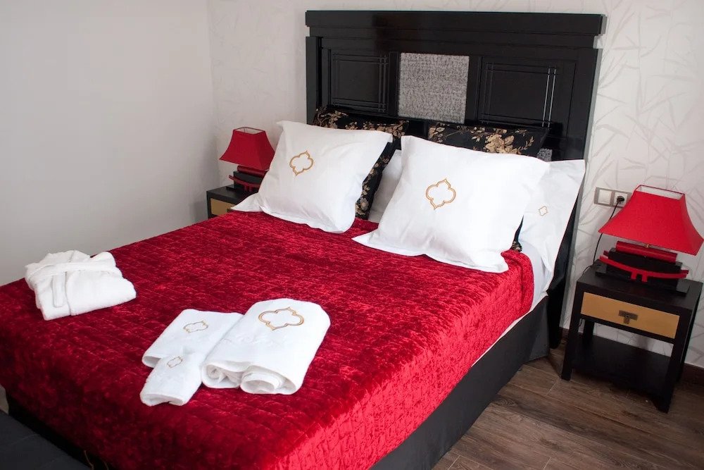 Apartamentos "El Escondite de María"