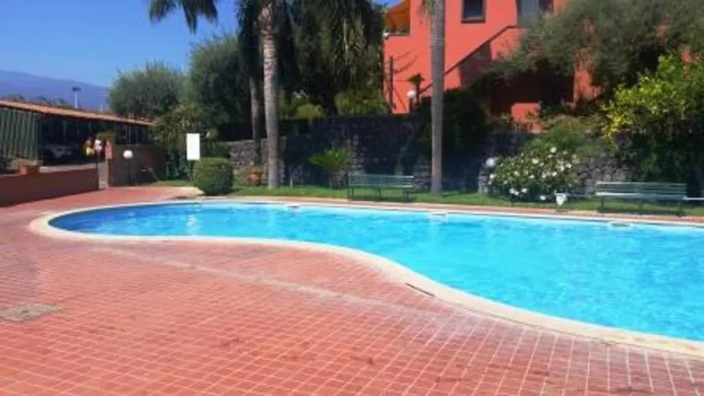 Apartment with one bedroom in Giardini Naxos with shared pool and furnished garden 150 m from the beach