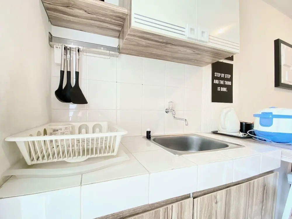Bright and Private 2BR Apartment at Parahyangan Residence near Nara Park By Travelio