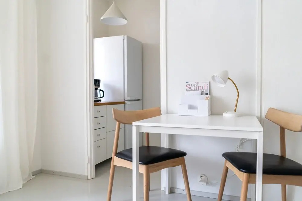 Upper floor studio with a balcony