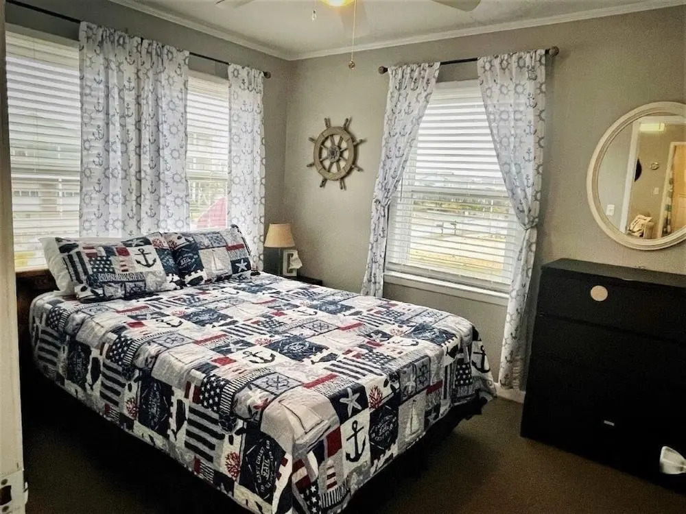 Sandy Bottoms 4 Bedroom Home by RedAwning