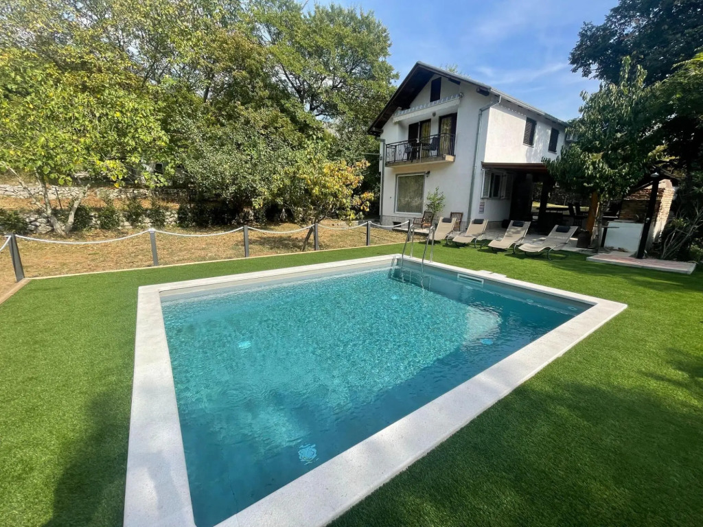 Vacation home with private swimming pool surrounded by nature