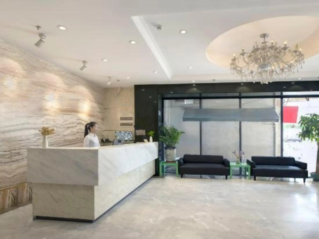 Xingyi Chain Hotel Jiangxia Metro Station