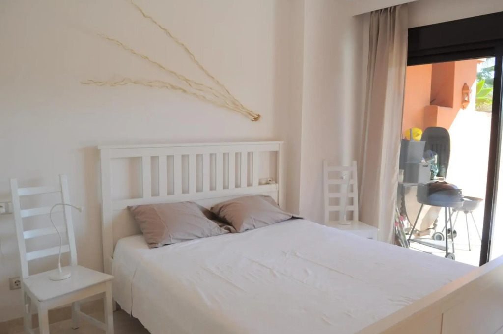Precioso apartamento con jardín y piscina comunitaria