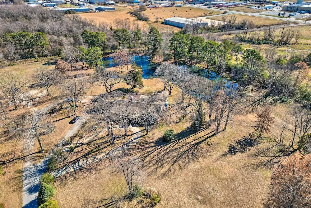 Private Pond + Patio: Expansive Escape in Rogers