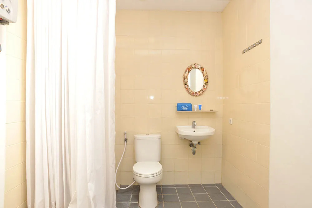 巴厘岛艾里瑞农图卡巴巴东 21 C 区 9 号酒店(Airy Eco Renon Tukad Badung Dua Puluh Satu Blok C 9 Bali)