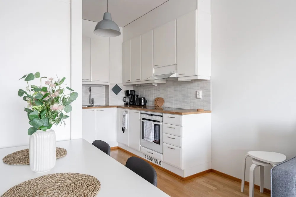 Top Floor 1BR Home with Parking, Sauna and Balcony