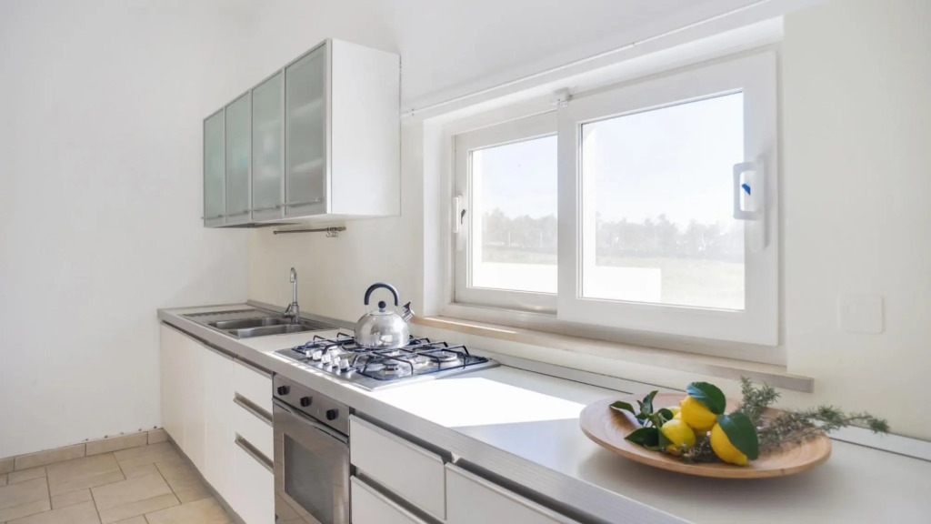 Typical property with swimming pool completely surrounded by secular olive trees and Mediterrean maq-VILLATRULLO MELOGRANO