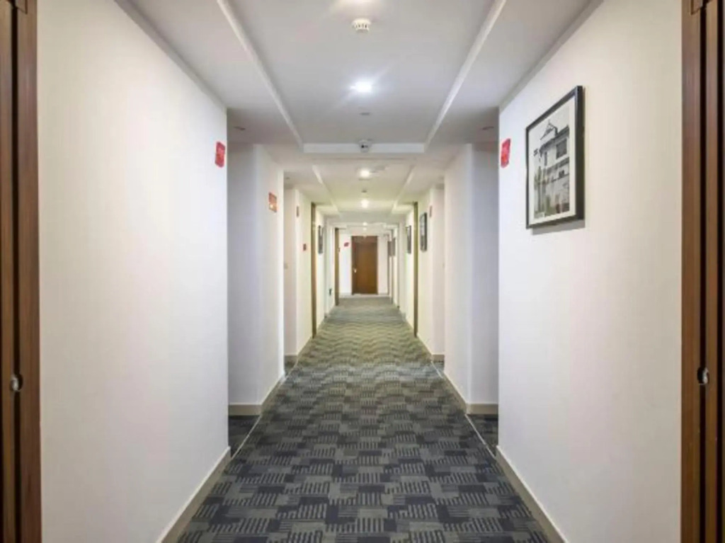 Yanzhoufu Apartment Hotel