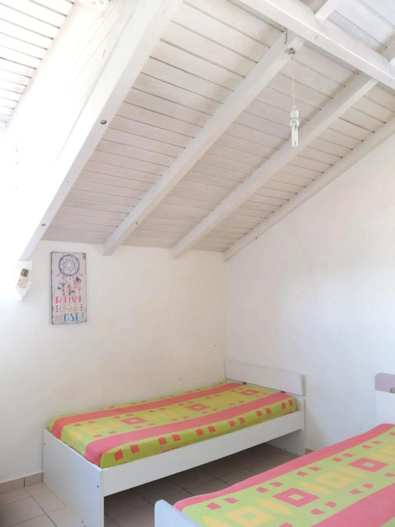 Maison de 2 chambres avec jardin clos et wifi a Le Gosier a 3 km de la plage