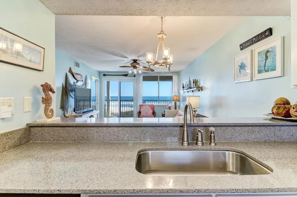 Beach Style Condo Includes Google Mini Home And Beach Access 2 Bedroom Condo by RedAwning